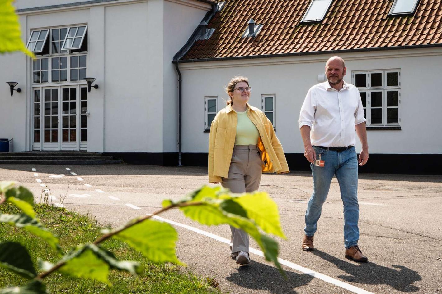 Daria walking the Lundbeck Site with her supervisor